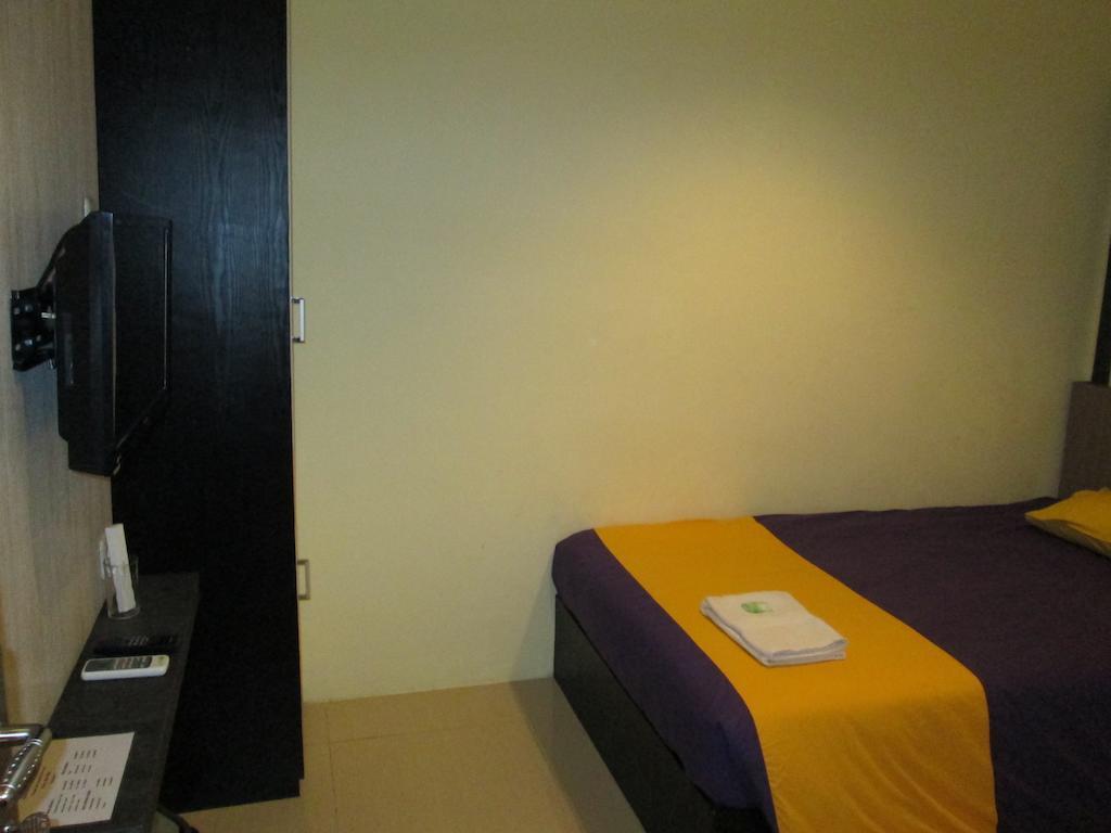 Green Leaf Inn Pontianak Quarto foto