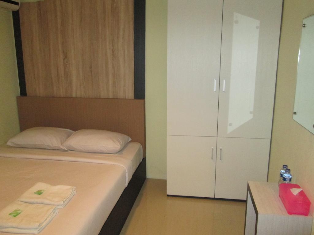 Green Leaf Inn Pontianak Quarto foto